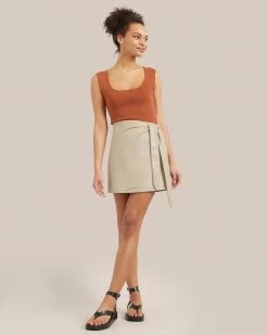 Hua Jia Celebrate Arabella Vegan Leather Wrap Mini Skirt