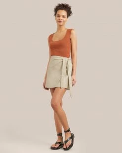 Hua Jia Celebrate Arabella Vegan Leather Wrap Mini Skirt