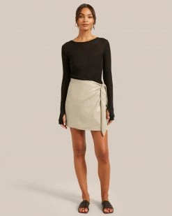 Hua Jia Celebrate Arabella Vegan Leather Wrap Mini Skirt