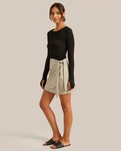 Hua Jia Celebrate Arabella Vegan Leather Wrap Mini Skirt