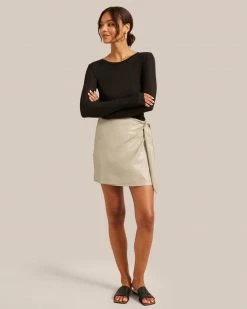Hua Jia Celebrate Arabella Vegan Leather Wrap Mini Skirt