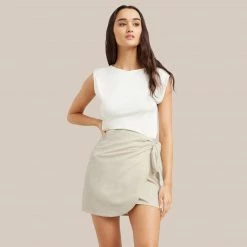 UBASE INTERNATIONAL, INC. Esme Sleeveless Slit-Neck Tank